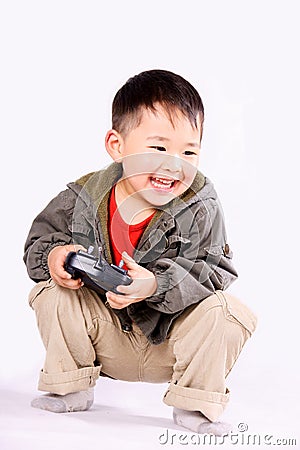 Boy with remote controller Stock Photo