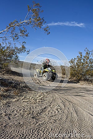 Boy Riding Quad Stock Photo