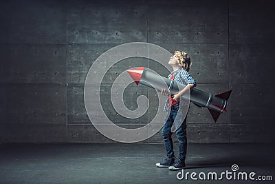 Boy with rocket Stock Photo