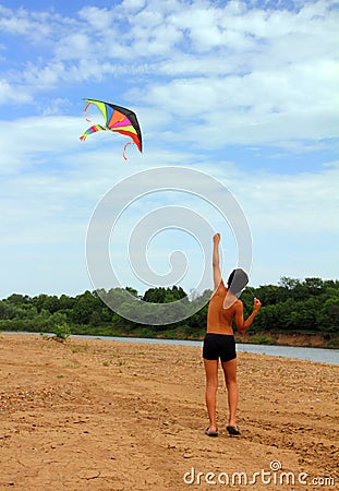 Boy running kite Stock Photo