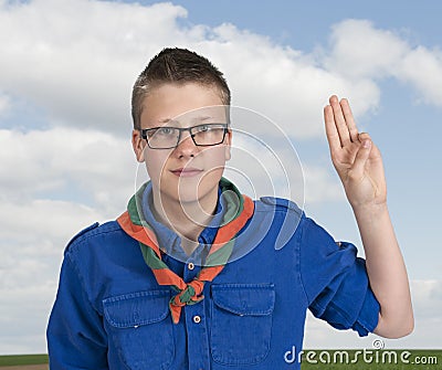 Boy scout making an oath swear Stock Photo