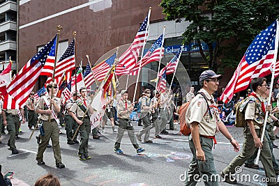 Boy Scouts Group Marching in Grand Floral Parade Editorial Stock Photo