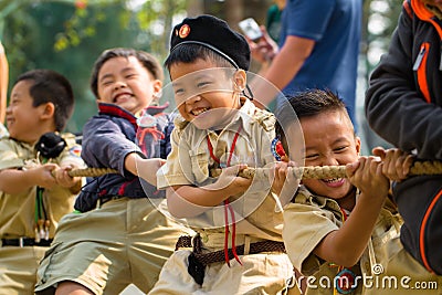 Boy Scouts play tug of war Editorial Stock Photo