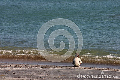 The boy and the sea. Stock Photo