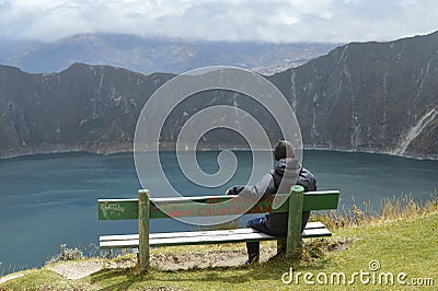 Boy, seat, Quilotoa crater, lagoon, emerald Editorial Stock Photo