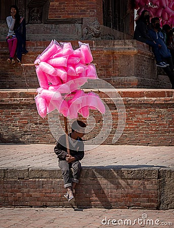 Boy Selling Cotton Candy Editorial Stock Photo