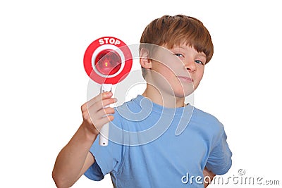 Boy shows stop sign Stock Photo