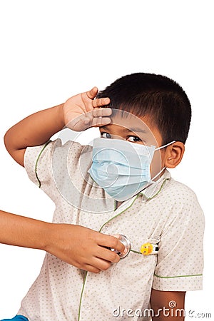 boy sick wear mask and themometer Stock Photo