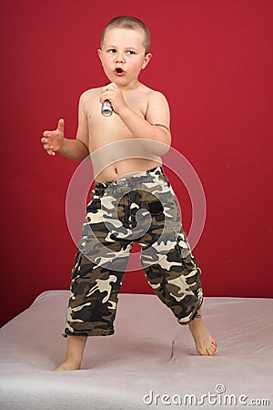 Boy sings Stock Photo