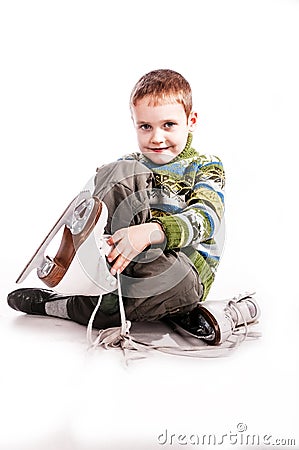 Boy with skates, insulated background Stock Photo