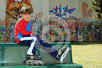 Boy skating on the rollerblades Stock Photo
