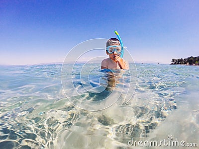 Boy snorkeler ready to dive Stock Photo