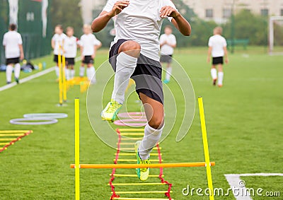 Boy Soccer Player In Training. Young Soccer Players at Practice Stock Photo