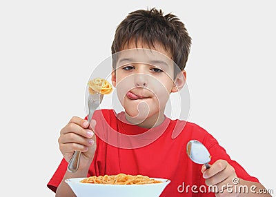 A boy and spaghetti Stock Photo