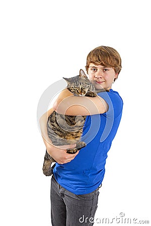 Boy spooning with his cat Stock Photo