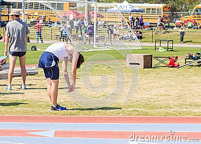 Boy Exhausted After 1600 Meter Heat at Invitational Editorial Stock Photo