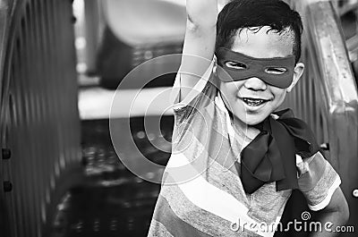 Boy Superhero Dressup Aspiration Playground Concept Stock Photo