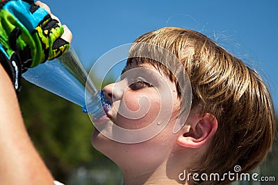 Boy is sweating and thursty Stock Photo