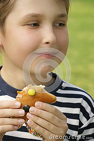 Boy with a sweet treat Stock Photo