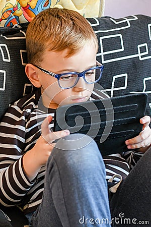 Boy with tablet Stock Photo