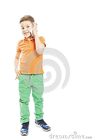 The boy is talking on a smartphone, full-length. Free space for text. Vertical. Isolated on a white background Stock Photo
