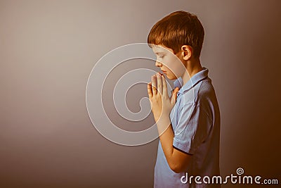 Boy teenager European appearance in a blue shirt Stock Photo