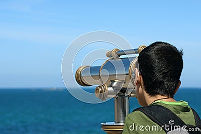 The boy and the telescope Stock Photo