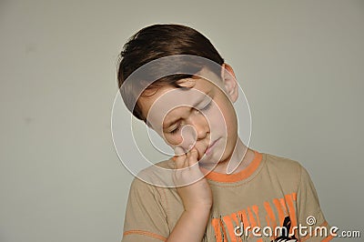 A boy with a toothache Stock Photo