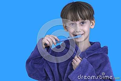 the boy with the toothbrush. Health care, dental hygiene. Little boy cleaning teeth. Stock Photo