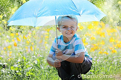 Boy with umbrella Stock Photo