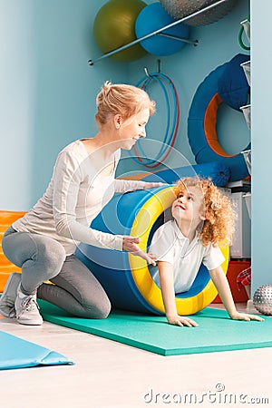 Boy using sensory integration equipment Stock Photo