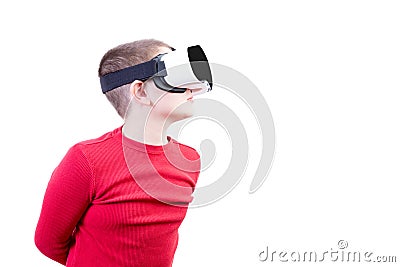 Boy with virtual reality glasses peers left Stock Photo
