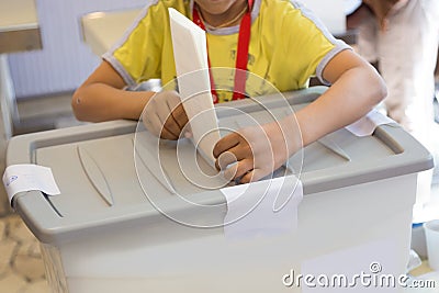 Boy voting on democratic election. Stock Photo