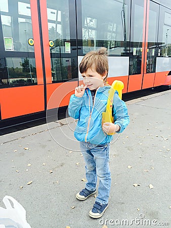 Boy waiting the tram Editorial Stock Photo