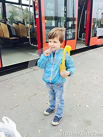 Boy waiting the tram Editorial Stock Photo