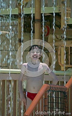 Boy in the waterpark Stock Photo