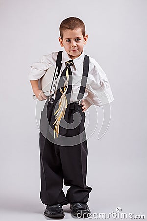 Boy wearing oversized clothes Stock Photo