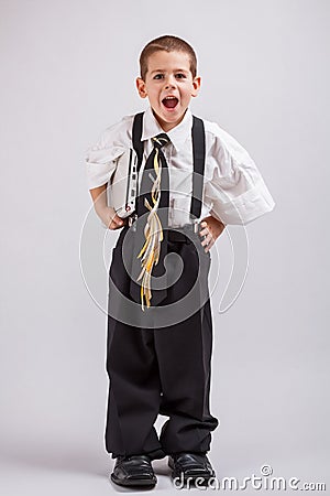 Boy wearing oversized clothes Stock Photo