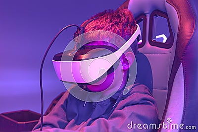 Boy wearing vr headset at virtual reality center Stock Photo