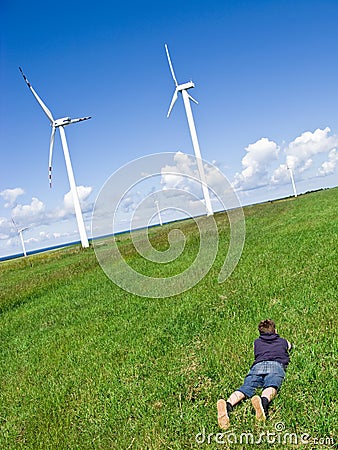 Boy and wind turbines Stock Photo