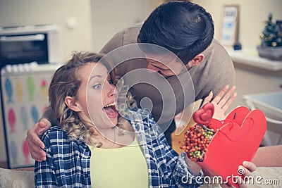 Boyfriend and his girlfriend celebrating holiday. Young couple Stock Photo