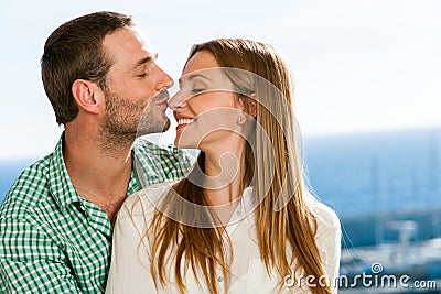 Boyfriend kissing girl on nose. Stock Photo