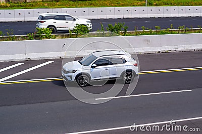 Honda WR-V driving fast on trans jawa highway Editorial Stock Photo