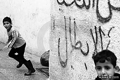 Boys in Aida refugee camp in Ramallah Editorial Stock Photo