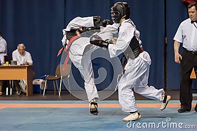 The boys compete in the Kobudo Editorial Stock Photo