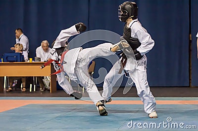 The boys compete in the Kobudo Editorial Stock Photo