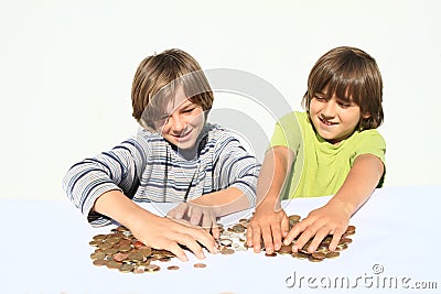 Boys dividing money Stock Photo