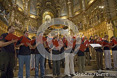 Boys & girls choir sing in the Benedictine Abbey at Montserrat, Santa Maria de Montserrat, near Barcelona, Catalonia, Spain with Editorial Stock Photo