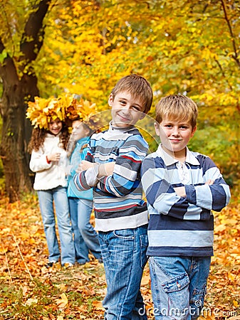 Boys and girls in fall Stock Photo