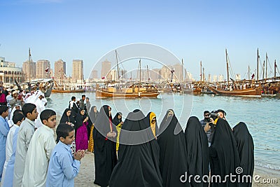 boys and girls in traditional Qatari dresses Editorial Stock Photo